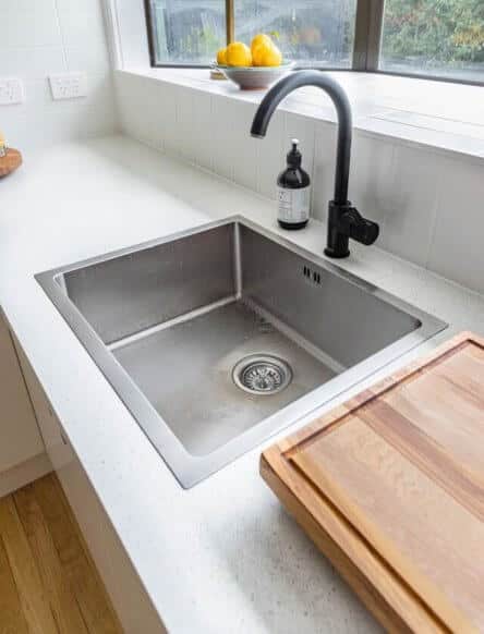 water_under_kitchen_sink.jpeg
