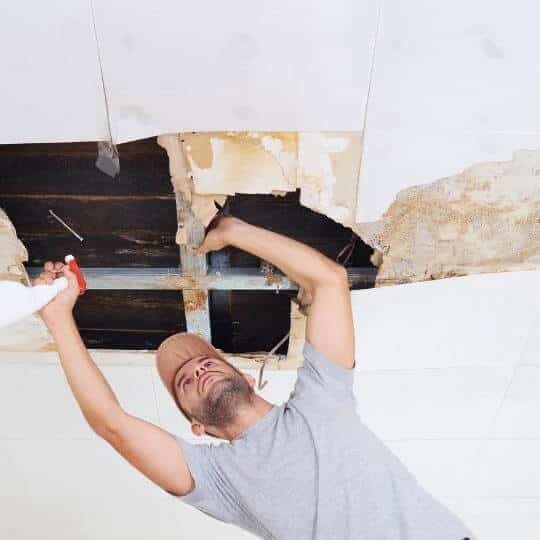 men_repairing_damaged_ceiling.jpeg