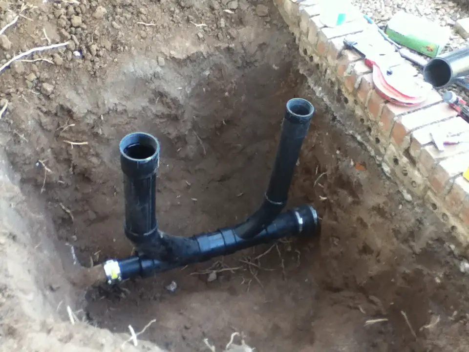 sewer_pipe_in_ground.jpeg